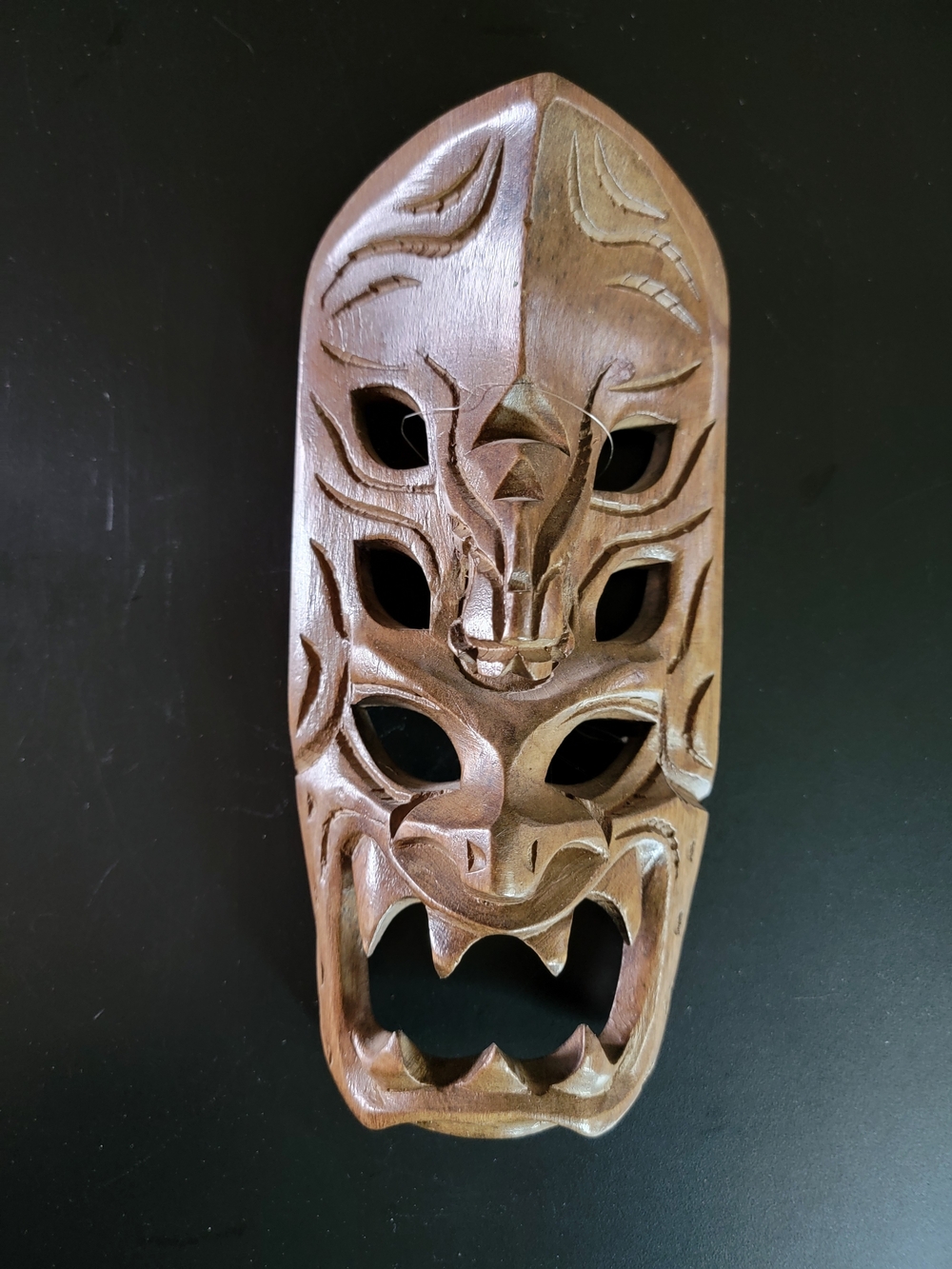 Hand-Carved Wooden Tribal Mask in Natural Brown